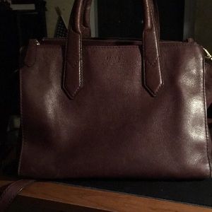 A beautiful leather fossil bag